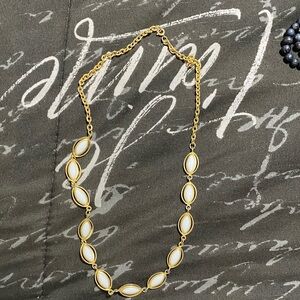 Elegant Gold and White Necklace